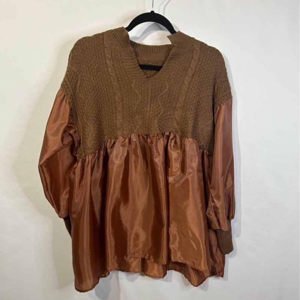 Woman’s ruffle swing sweater. Very thin lightweight bottom. Great for over leggi